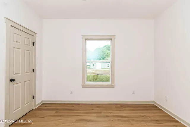 an empty room with window
