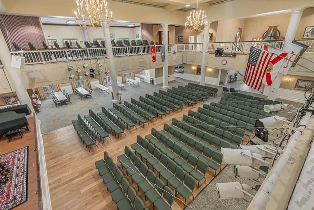 a dining room with furniture window and outside view