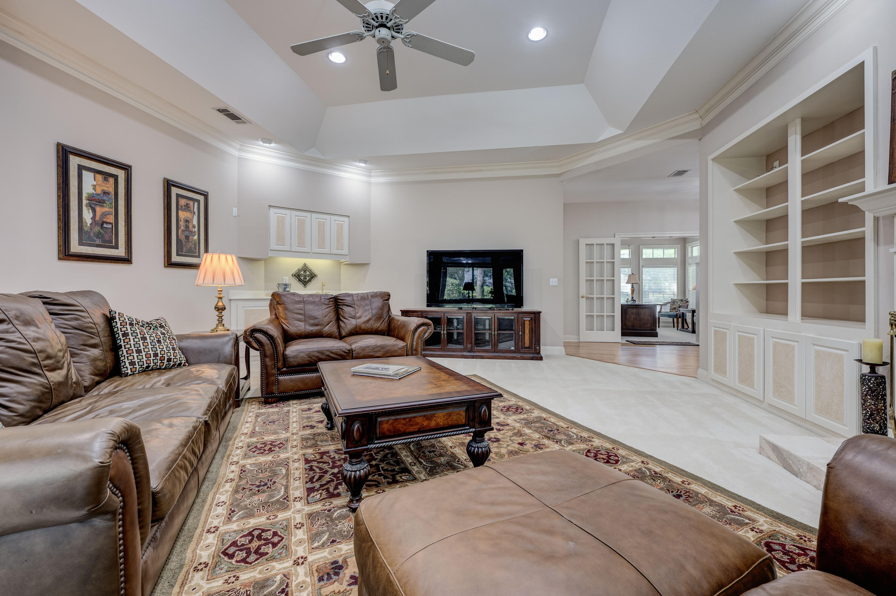 4418 Windrush Drive Niceville, FL 32578 - Photo 12 of 66 a living room with furniture and a flat screen tv