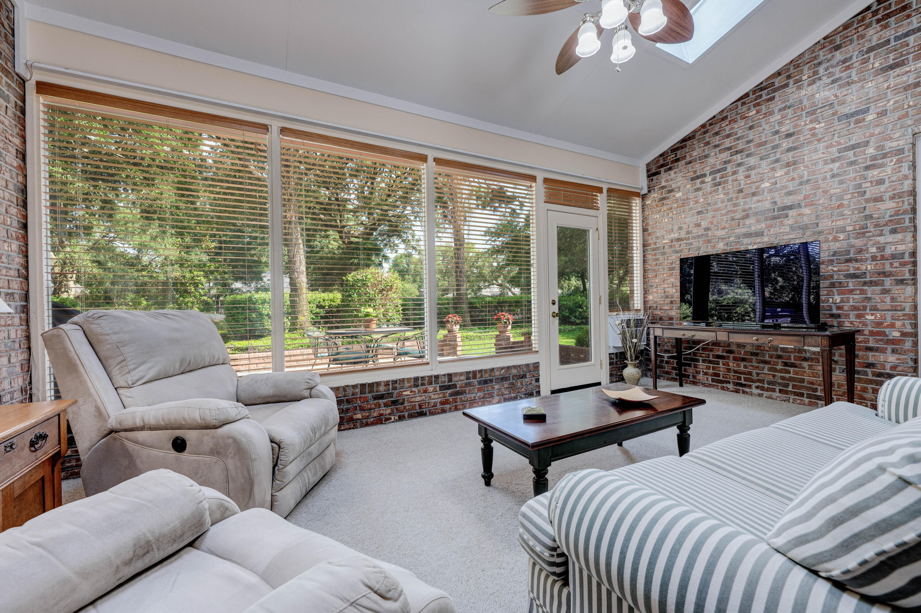 4418 Windrush Drive Niceville, FL 32578 - Photo 20 of 66 a living room with furniture and a large window