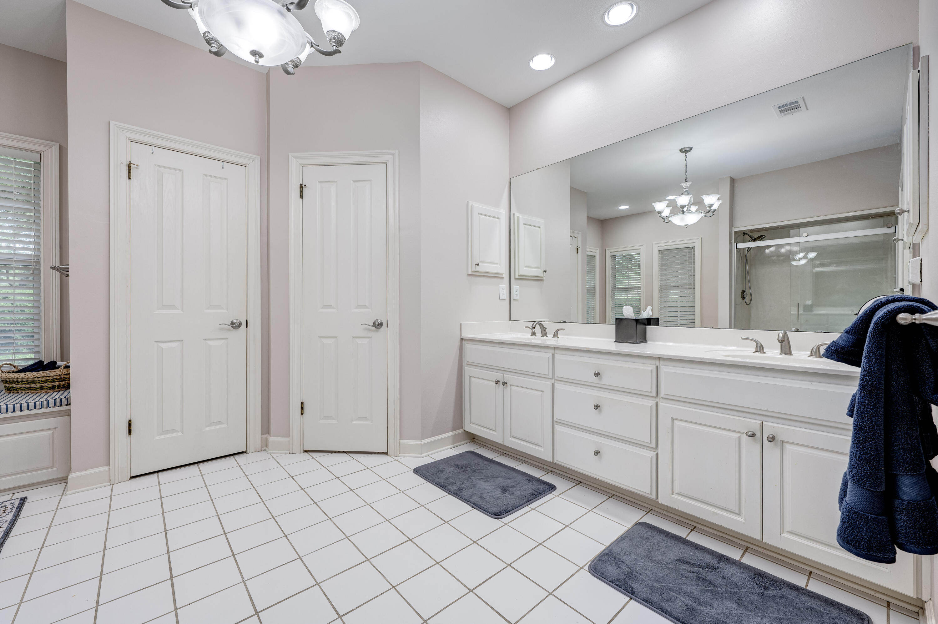 4418 Windrush Drive Niceville, FL 32578 - Photo 36 of 66 a spacious bathroom with a double vanity sink mirror and shower