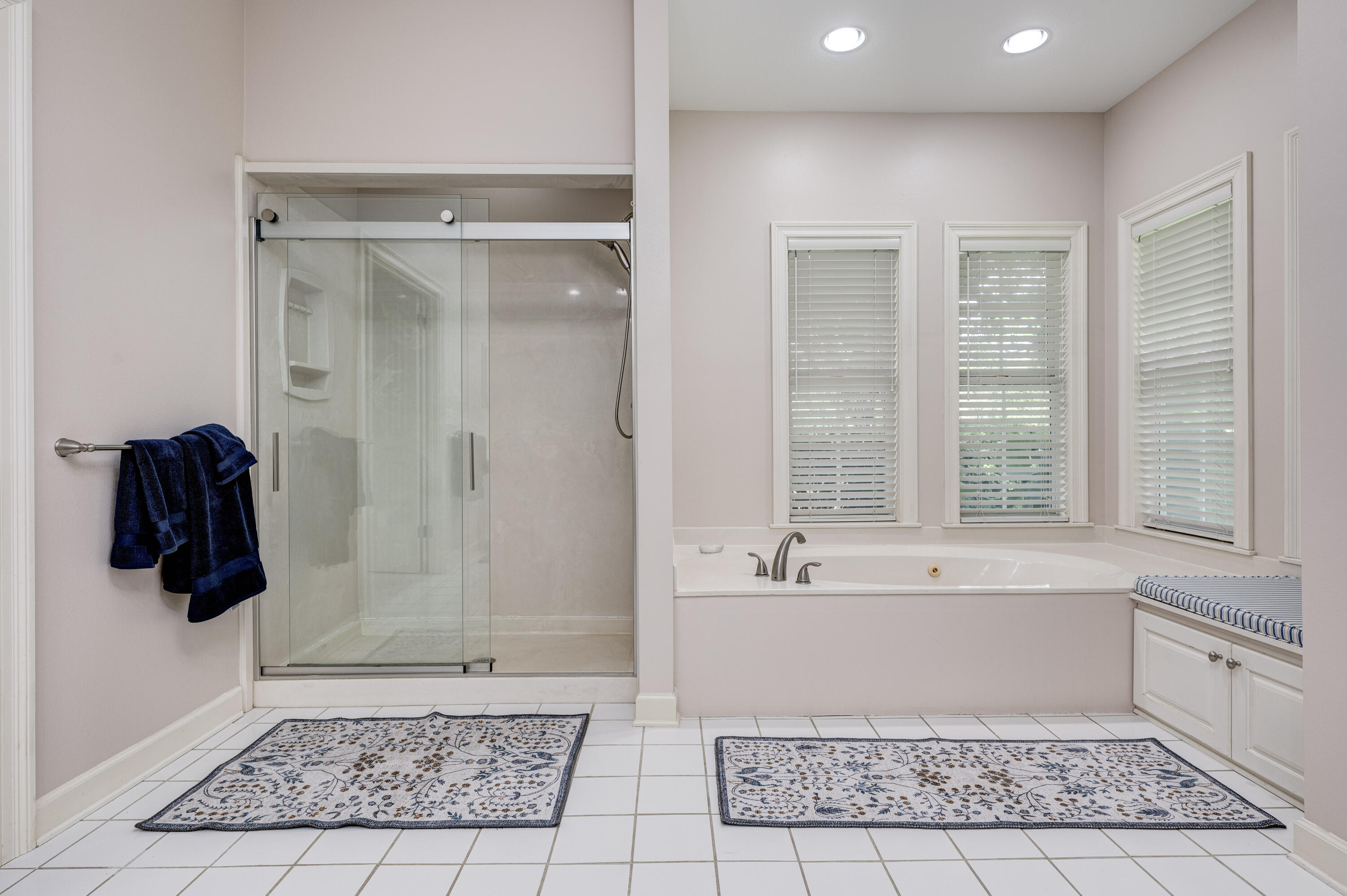 4418 Windrush Drive Niceville, FL 32578 - Photo 38 of 66 a bathroom with a bathtub and a shower