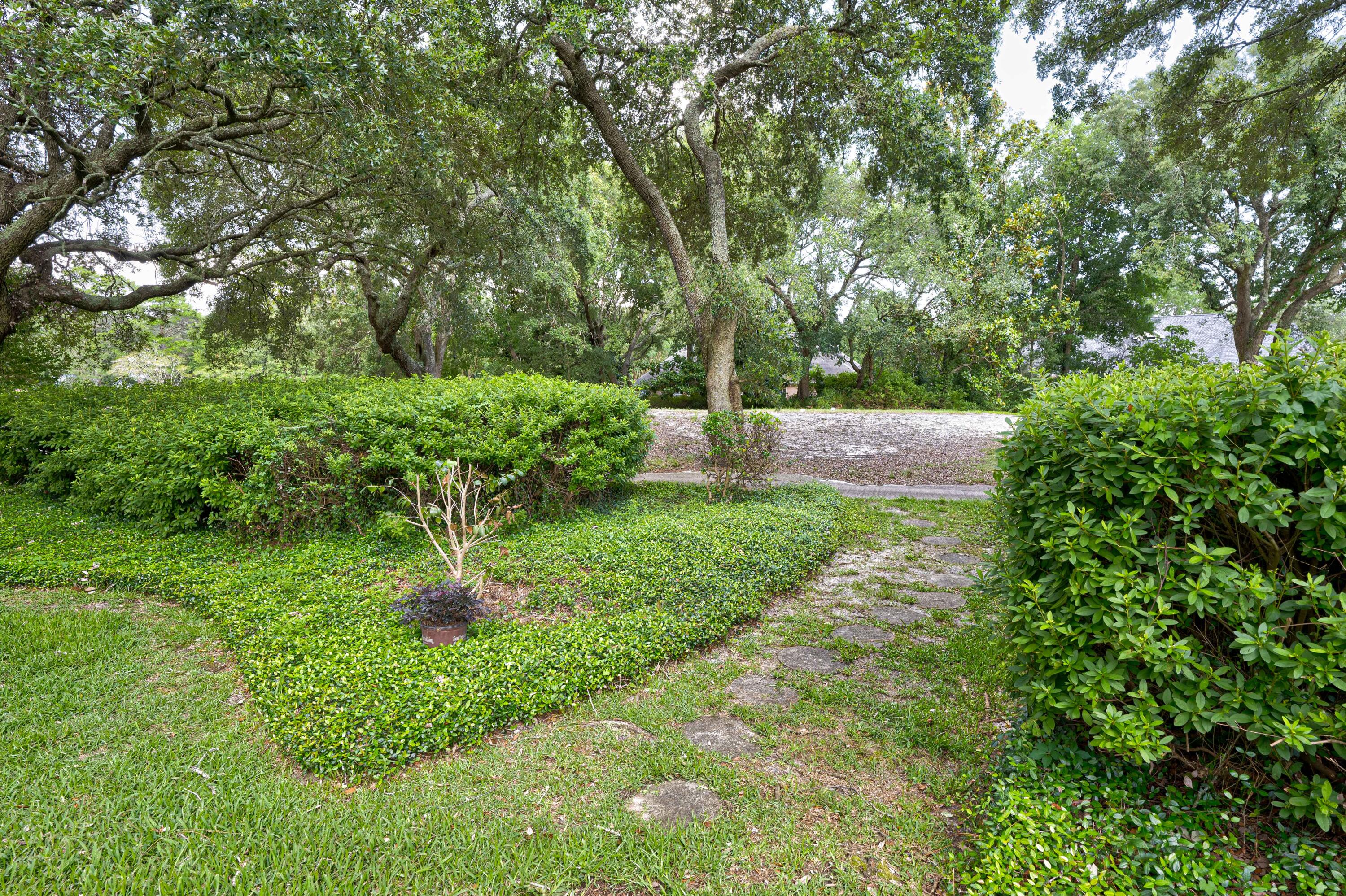 4418 Windrush Drive Niceville, FL 32578 - Photo 51 of 66 a big yard with lots of green space and plants