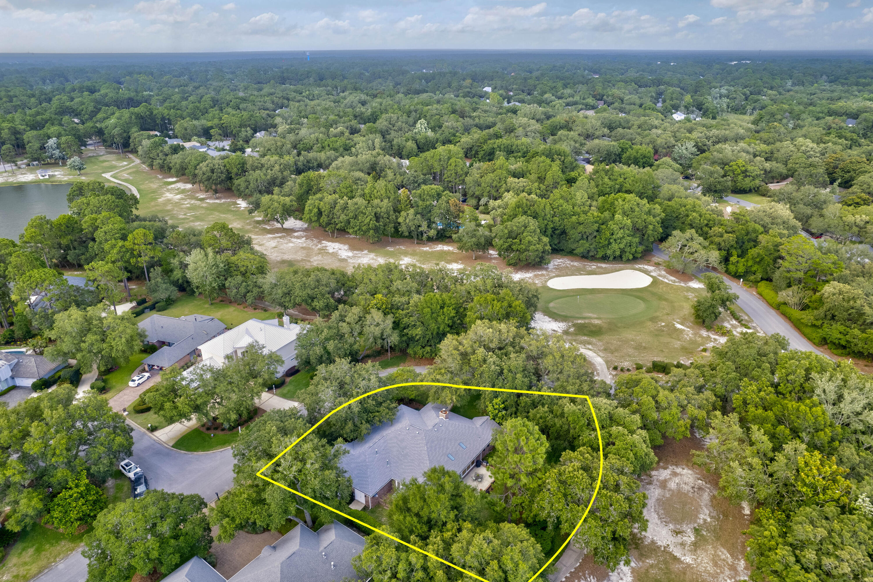 4418 Windrush Drive Niceville, FL 32578 - Photo 63 of 66 an aerial view of residential houses with outdoor space and trees