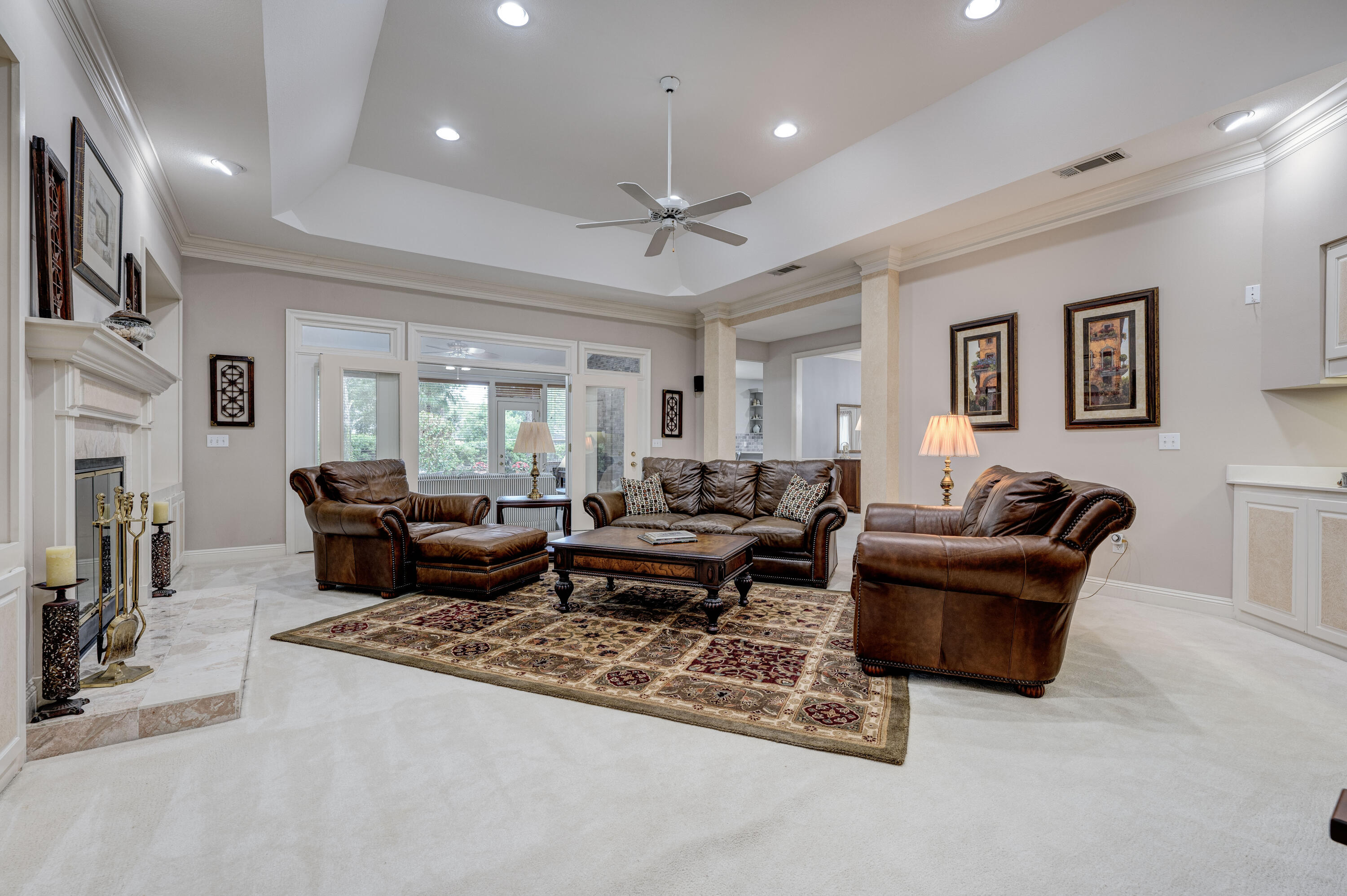 4418 Windrush Drive Niceville, FL 32578 - Photo 8 of 66 a living room with furniture a large window and a rug