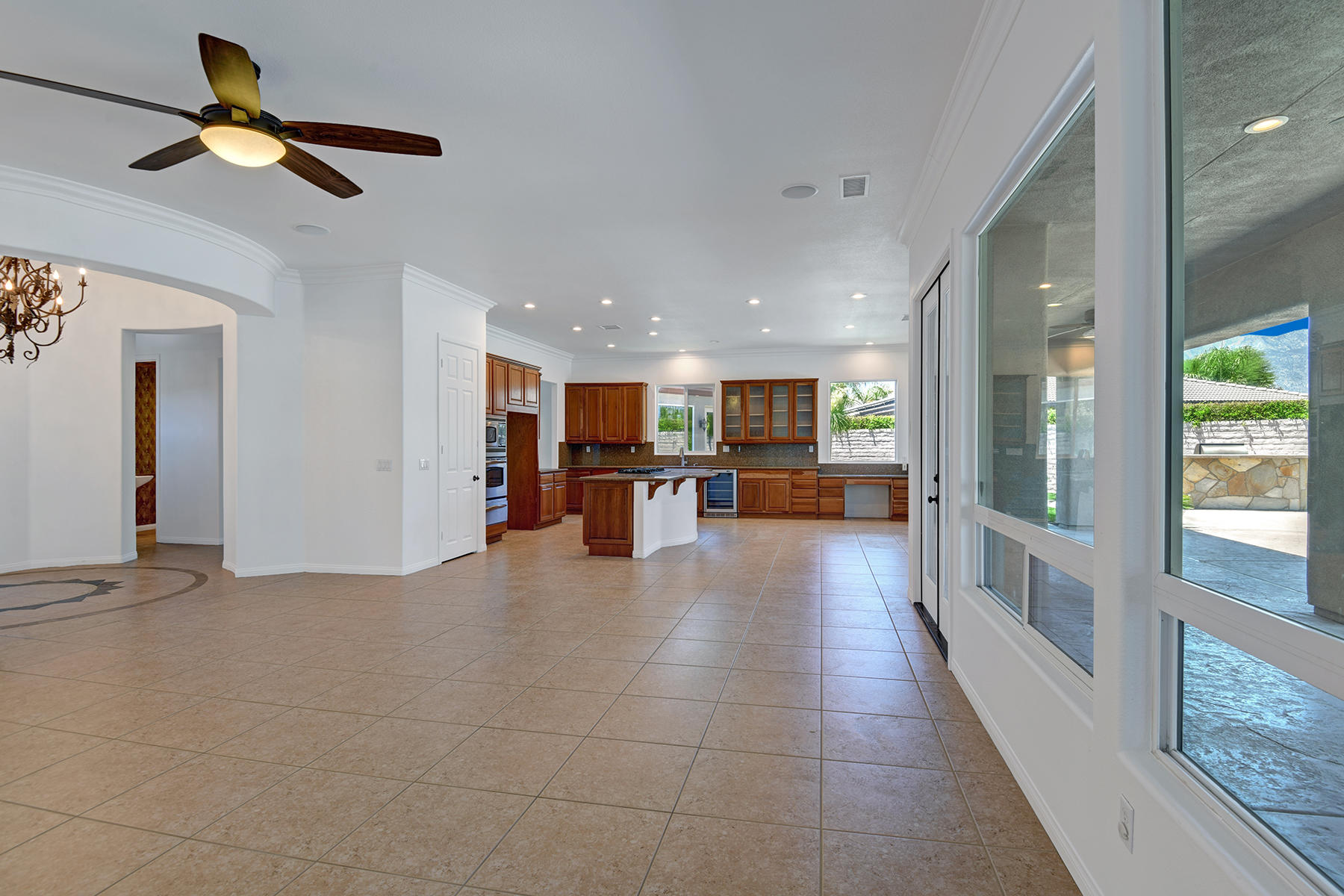 69702 Matisse Road Cathedral City, CA 92234 - Photo 14 of 52 LIVING ROOM REVERSE TO KITCHEN AND ENTRY