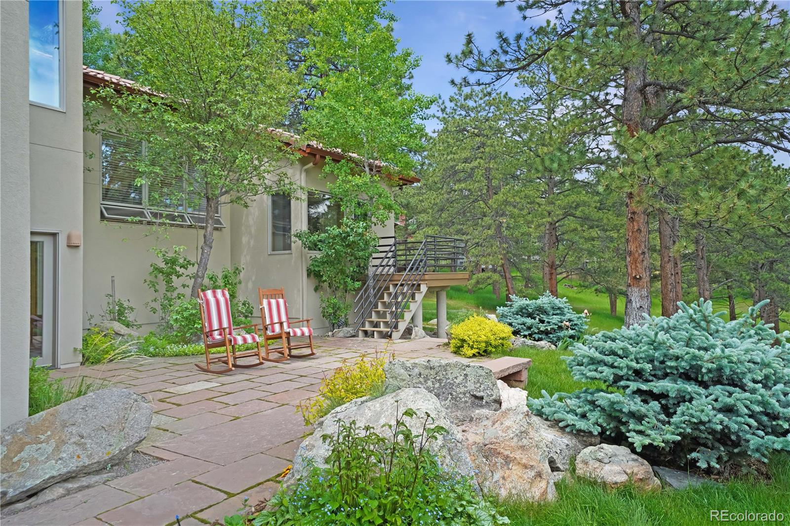 2398 Bitterroot Lane Golden, CO 80401 - Photo 13 of 34 a view of a backyard with plants and garden