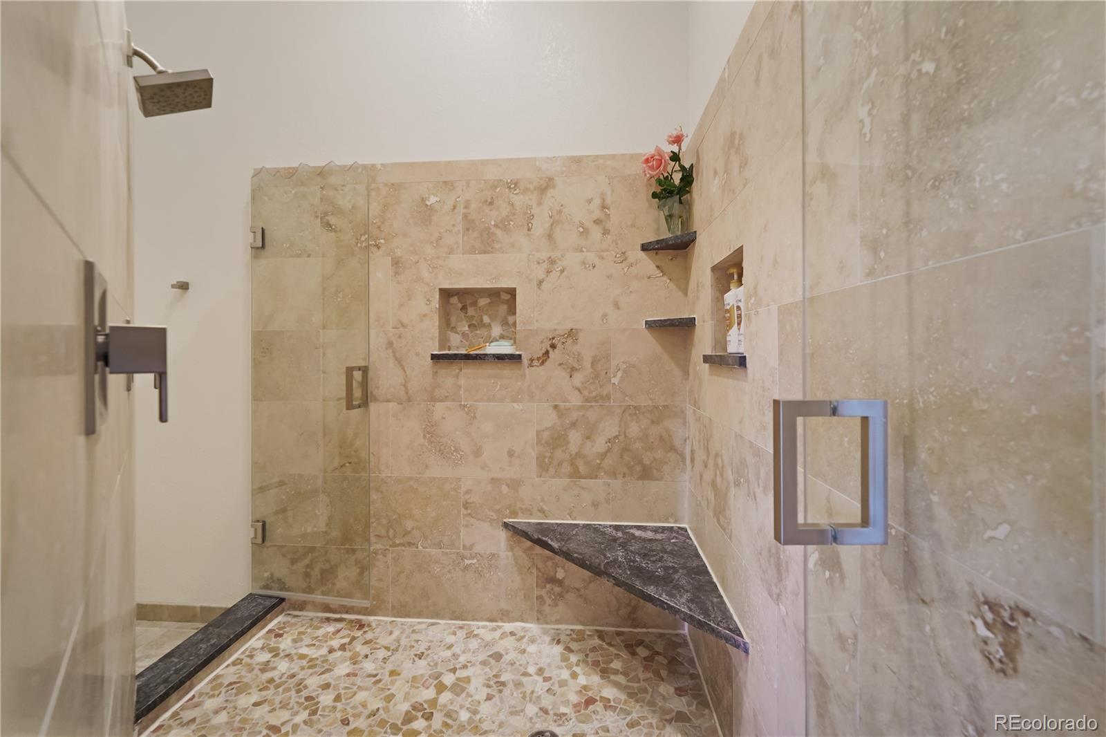 2398 Bitterroot Lane Golden, CO 80401 - Photo 17 of 34 a bathroom with a shower