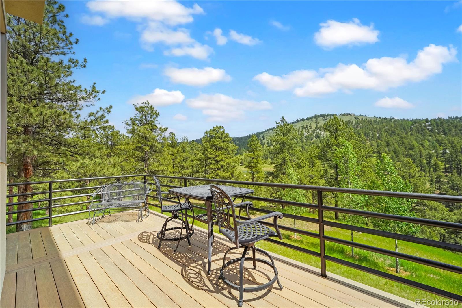 2398 Bitterroot Lane Golden, CO 80401 - Photo 4 of 34 a view of a terrace with seating space