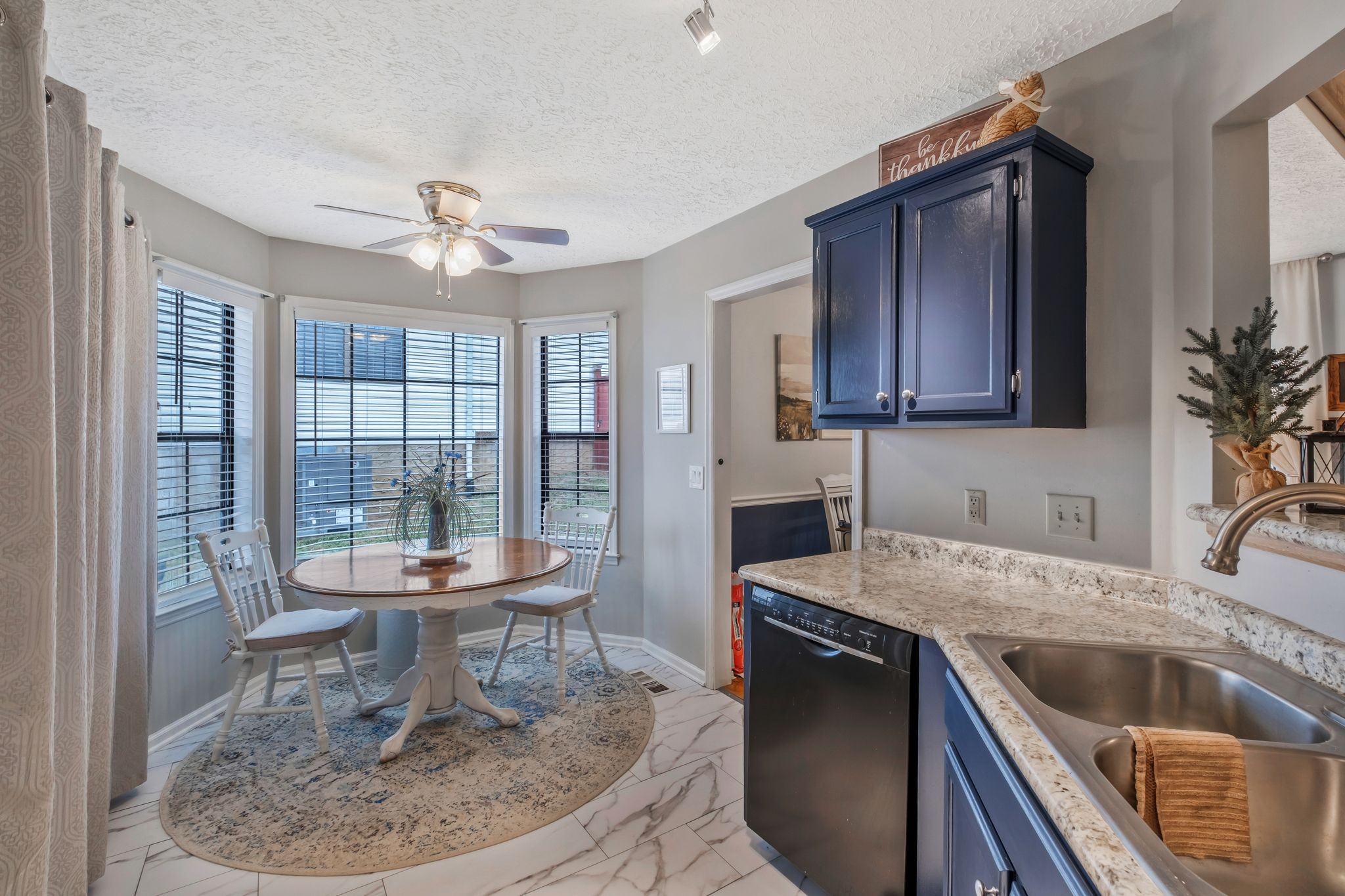 2048 Ransom Place Nashville, TN 37217 - Photo 13 of 30 a kitchen with a stove a sink and a refrigerator