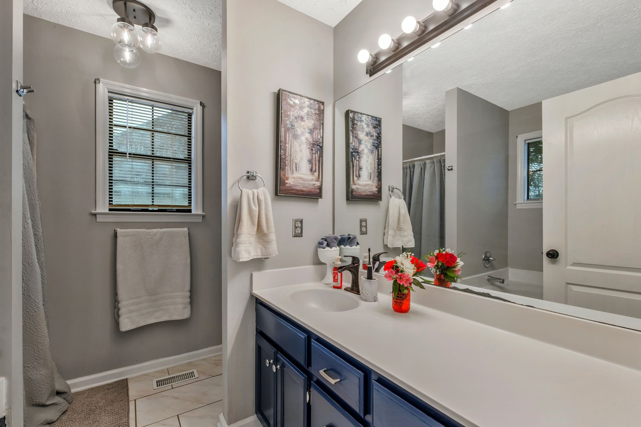 2048 Ransom Place Nashville, TN 37217 - Photo 20 of 30 a bathroom with a sink double vanity and a mirror