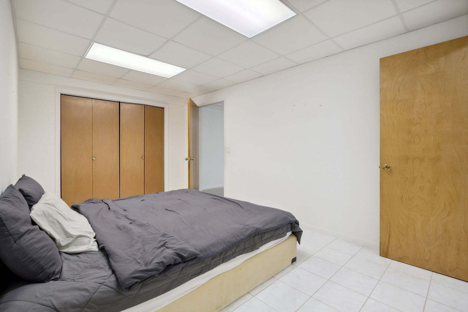 912 Elmdale Road Glenview, IL 60025 - Photo 45 of 55 a bedroom with a bed and a window