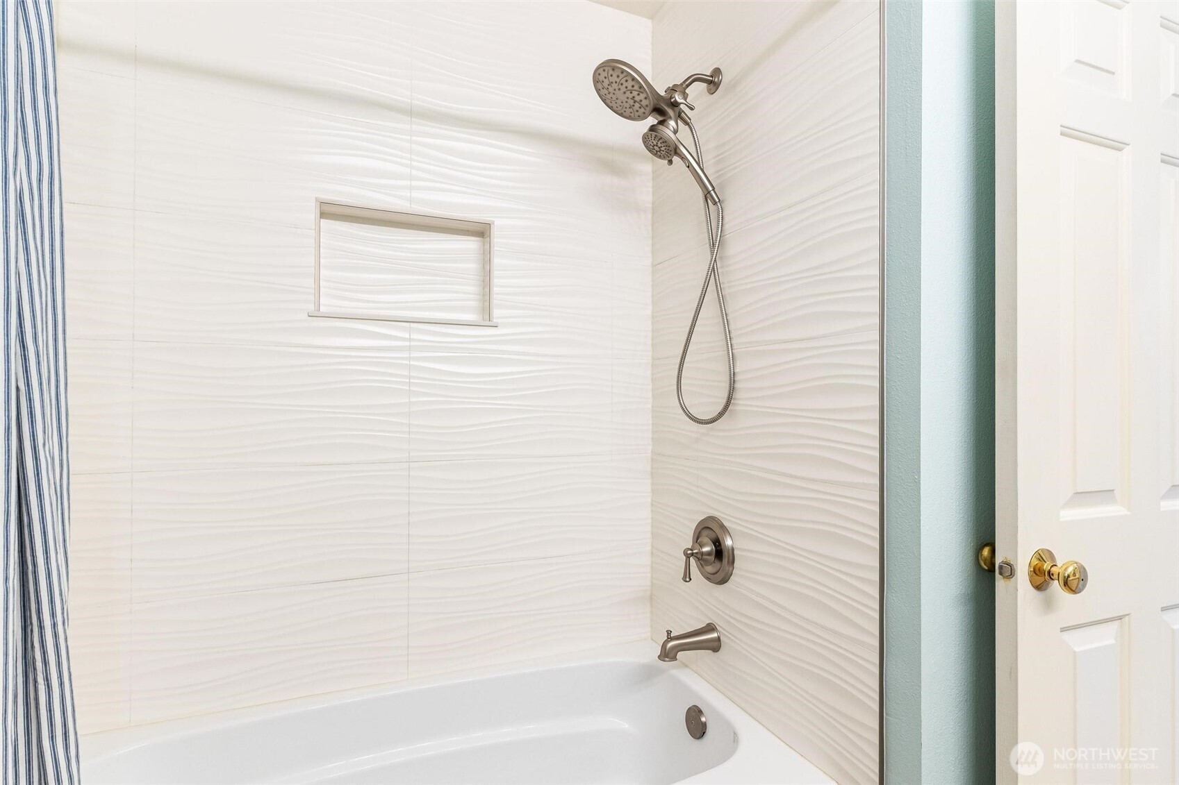 11856 Northeast 162nd Lane, Unit 94 Bothell, WA 98011 - Photo 18 of 36 a bathroom with a glass shower door