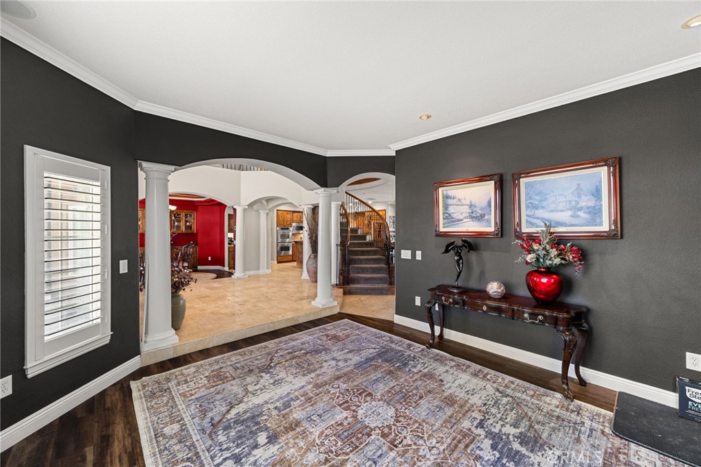 38136 Butterfly Court Yucaipa, CA 92399 - Photo 29 of 71 a living room with furniture and a flat screen tv