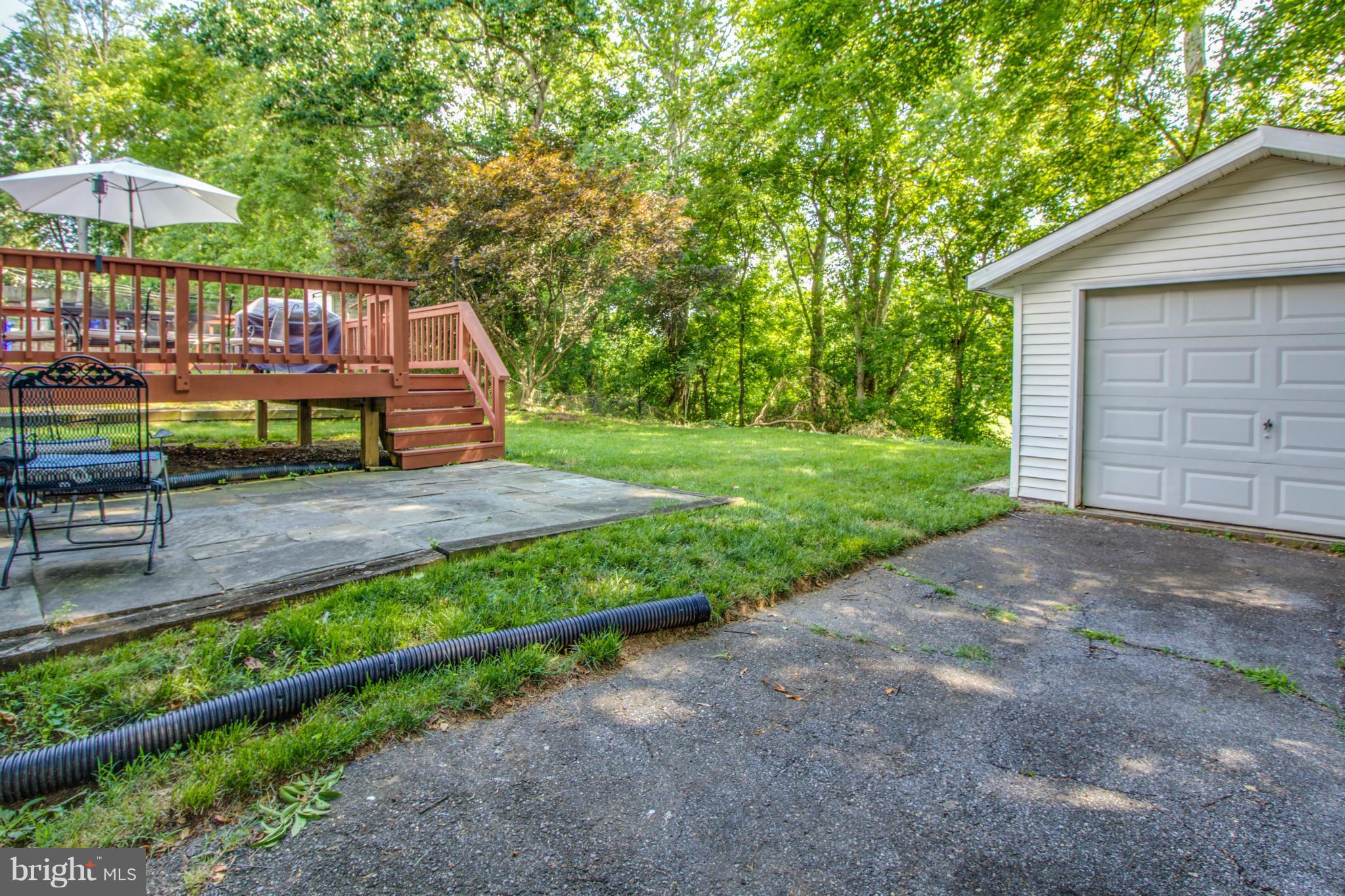 12320 Dewey Road Silver Spring, MD 20906 - Photo 19 of 22 Fenced yard with Detached Garage