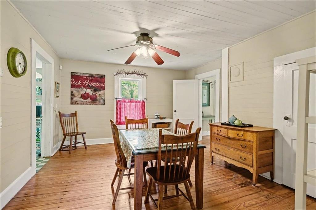 115 Price Street Bremen, GA 30110 - Photo 4 of 11 a view of a dining room with furniture and wooden floor
