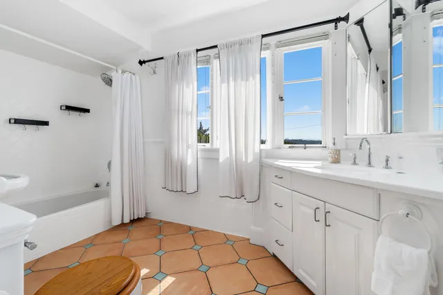 a kitchen with a sink stove and refrigerator