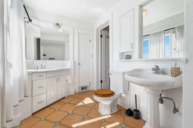 a bed room with a bed and a couch