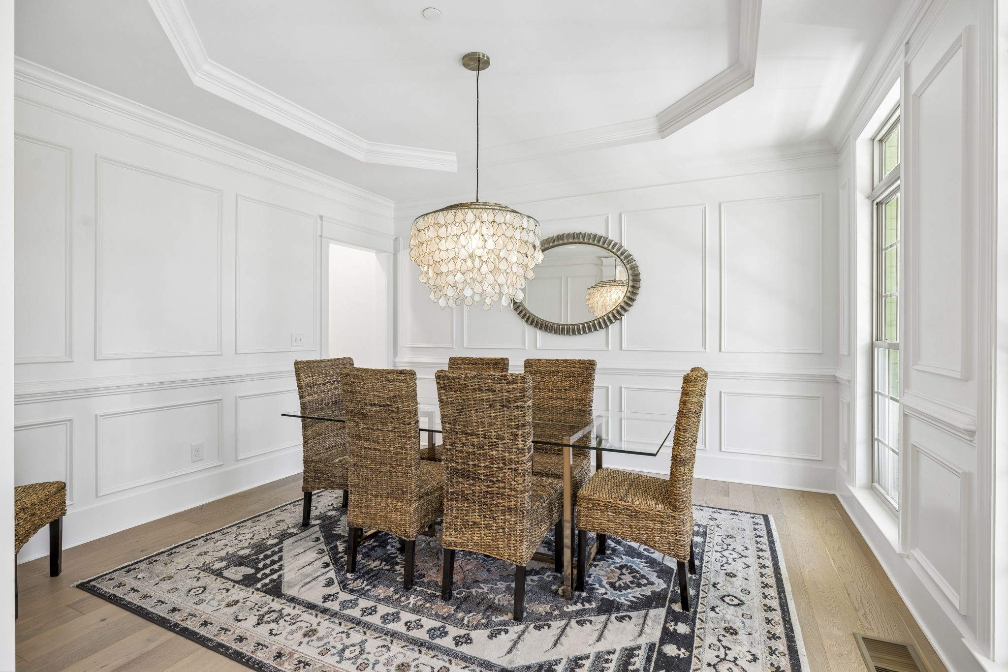 119 Stream Valley Boulevard Franklin, TN 37064 - Photo 17 of 100 a view of a dining room and hall with wooden floor
