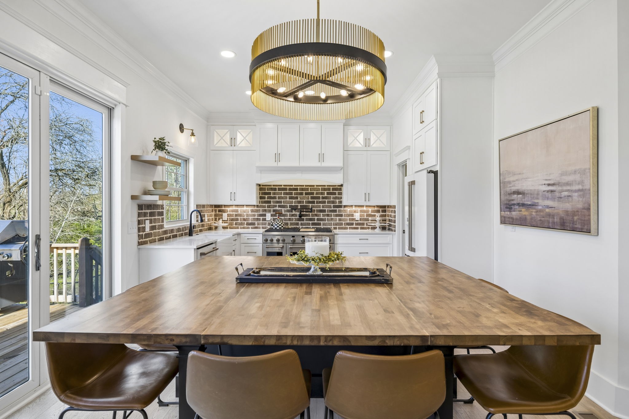 119 Stream Valley Boulevard Franklin, TN 37064 - Photo 27 of 100 a view of a dining room with furniture and a chandelier