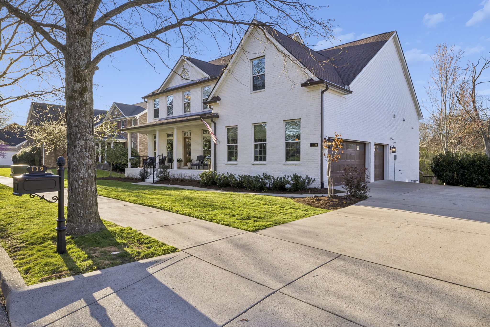 119 Stream Valley Boulevard Franklin, TN 37064 - Photo 3 of 100 a front view of a house with garden