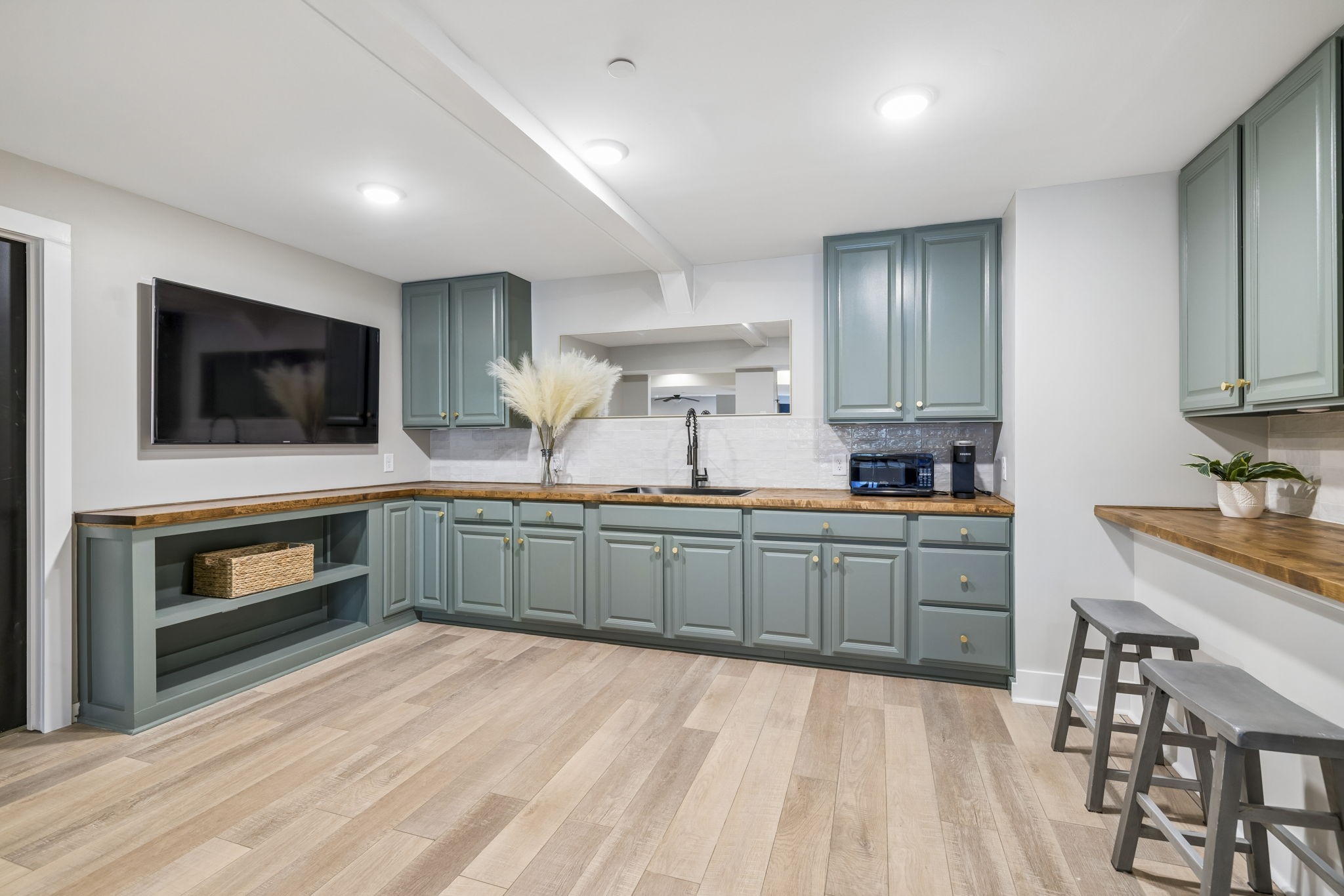 119 Stream Valley Boulevard Franklin, TN 37064 - Photo 60 of 100 a kitchen with sink a microwave and cabinets