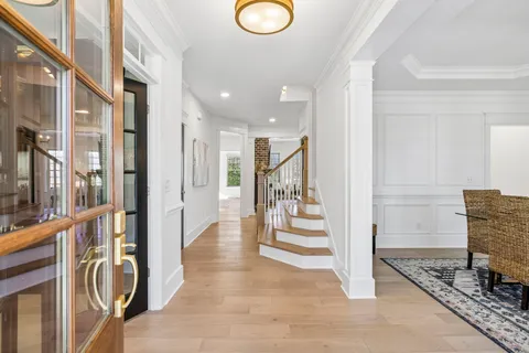 a dining room with furniture window wooden floor