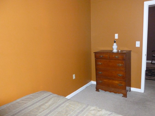 19 Chapel Street Warren, MA 01092 - Photo 18 of 30 a bedroom with a bed and a dresser