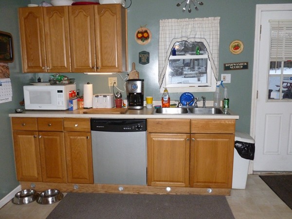 19 Chapel Street Warren, MA 01092 - Photo 4 of 30 a kitchen with sink cabinets and appliances