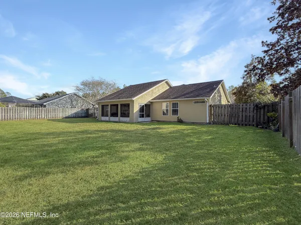 a house view with a garden space