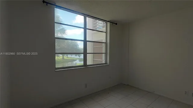 a bathroom with a shower and closet
