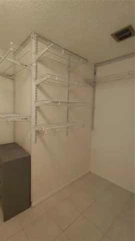 a bathroom with a double vanity sink and mirror