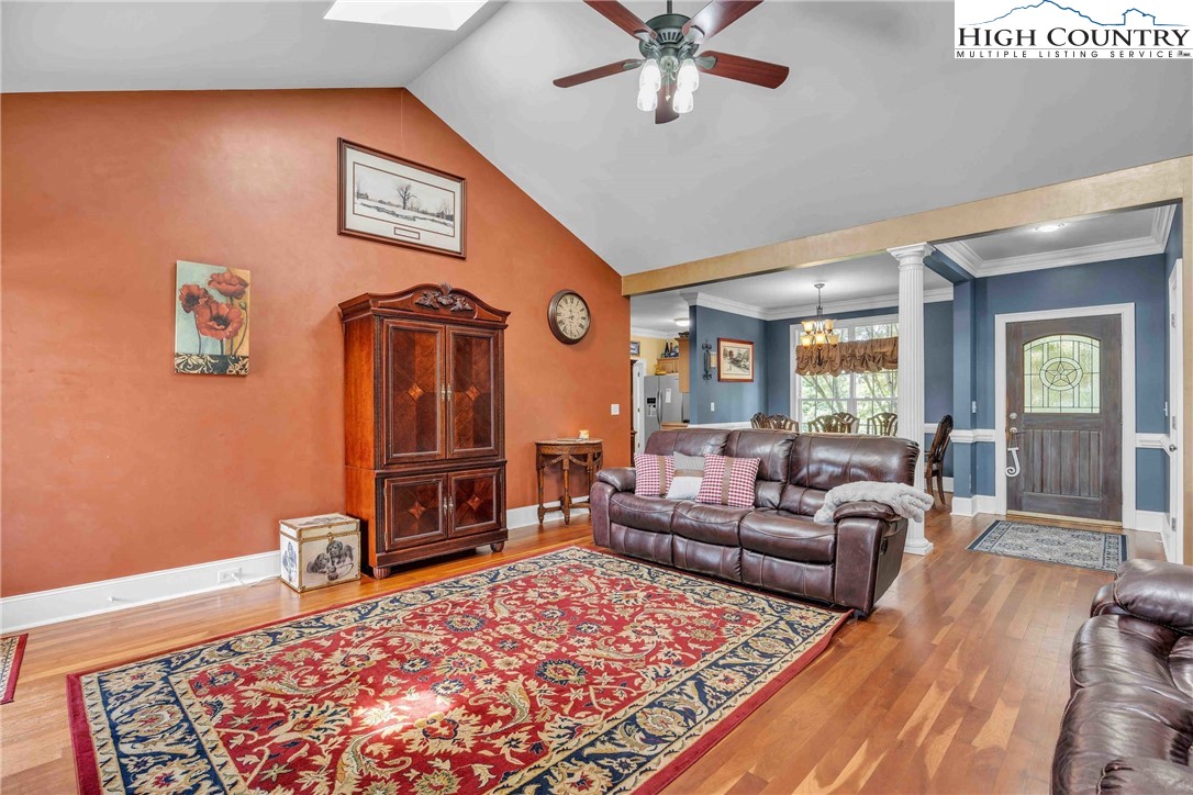 127 Deerfield Road West Jefferson, NC 28694 - Photo 13 of 47 a living room with furniture and a fireplace