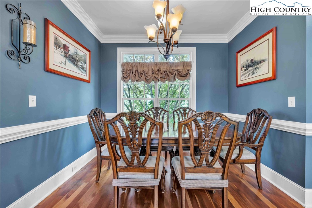 127 Deerfield Road West Jefferson, NC 28694 - Photo 14 of 47 a view of a dining room with furniture window and outside view
