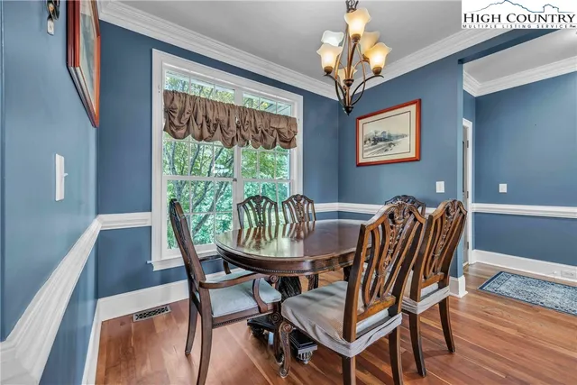a kitchen with granite countertop a sink and a stove top oven