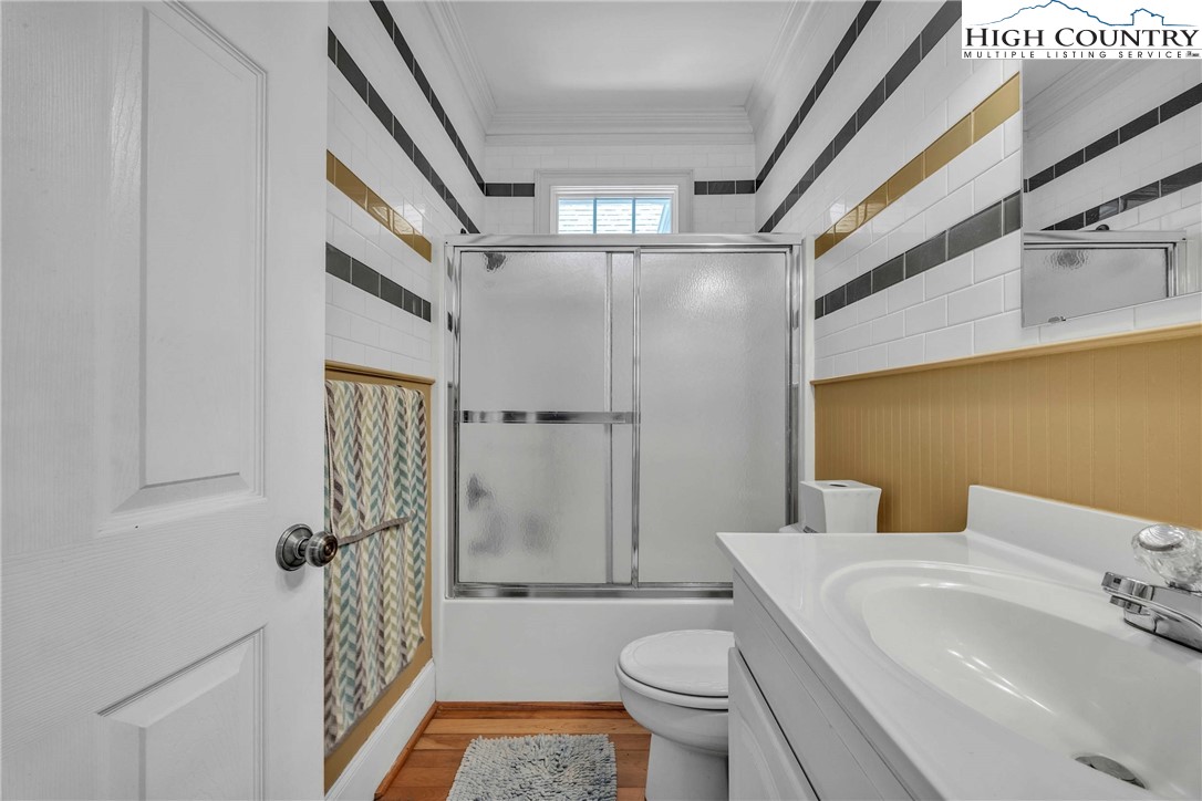 127 Deerfield Road West Jefferson, NC 28694 - Photo 29 of 47 a bathroom with a sink toilet and shower