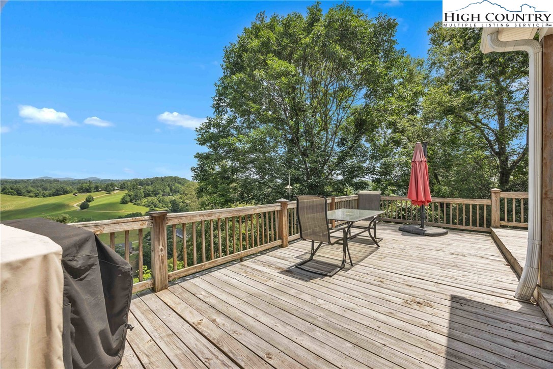 127 Deerfield Road West Jefferson, NC 28694 - Photo 35 of 47 a view of roof deck with patio