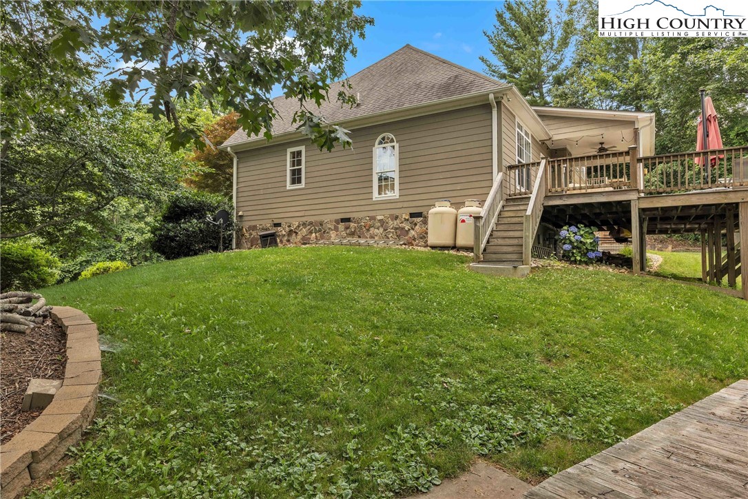 127 Deerfield Road West Jefferson, NC 28694 - Photo 37 of 47 a view of a house with a backyard
