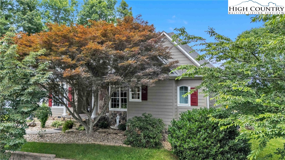 127 Deerfield Road West Jefferson, NC 28694 - Photo 5 of 47 a view of a house with a yard