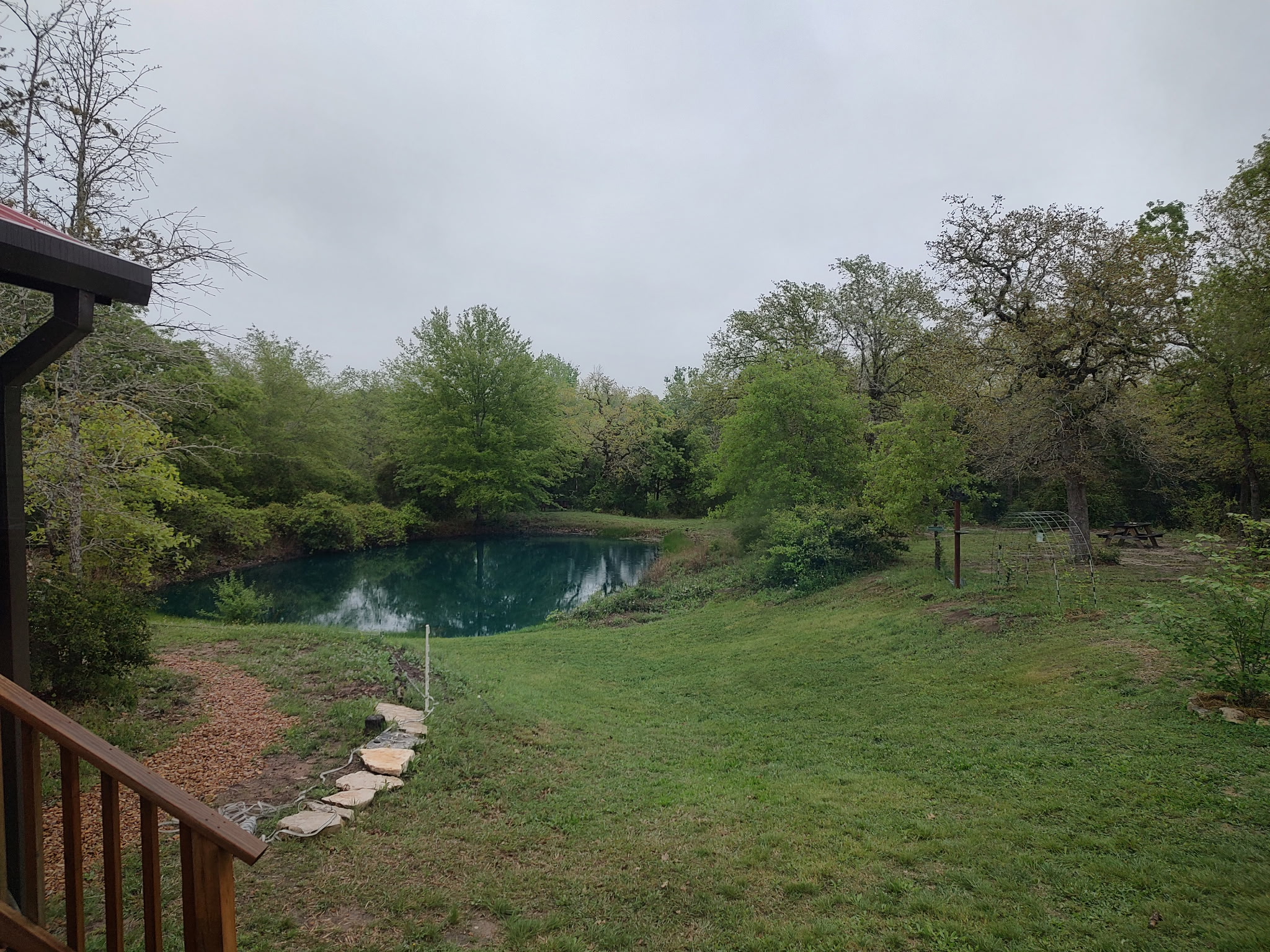 1705 Makinson Road West Point, TX 78963 - Photo 37 of 40 A tranquil pond awaits, surrounded by lush greenery for ultimate serenity.