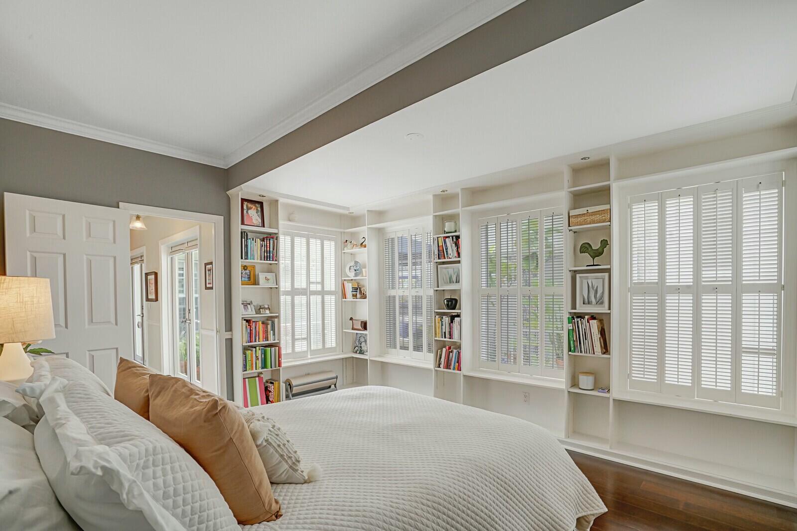 5961 Catesby Street Boca Raton, FL 33433 - Photo 17 of 41 a bedroom with furniture and large window