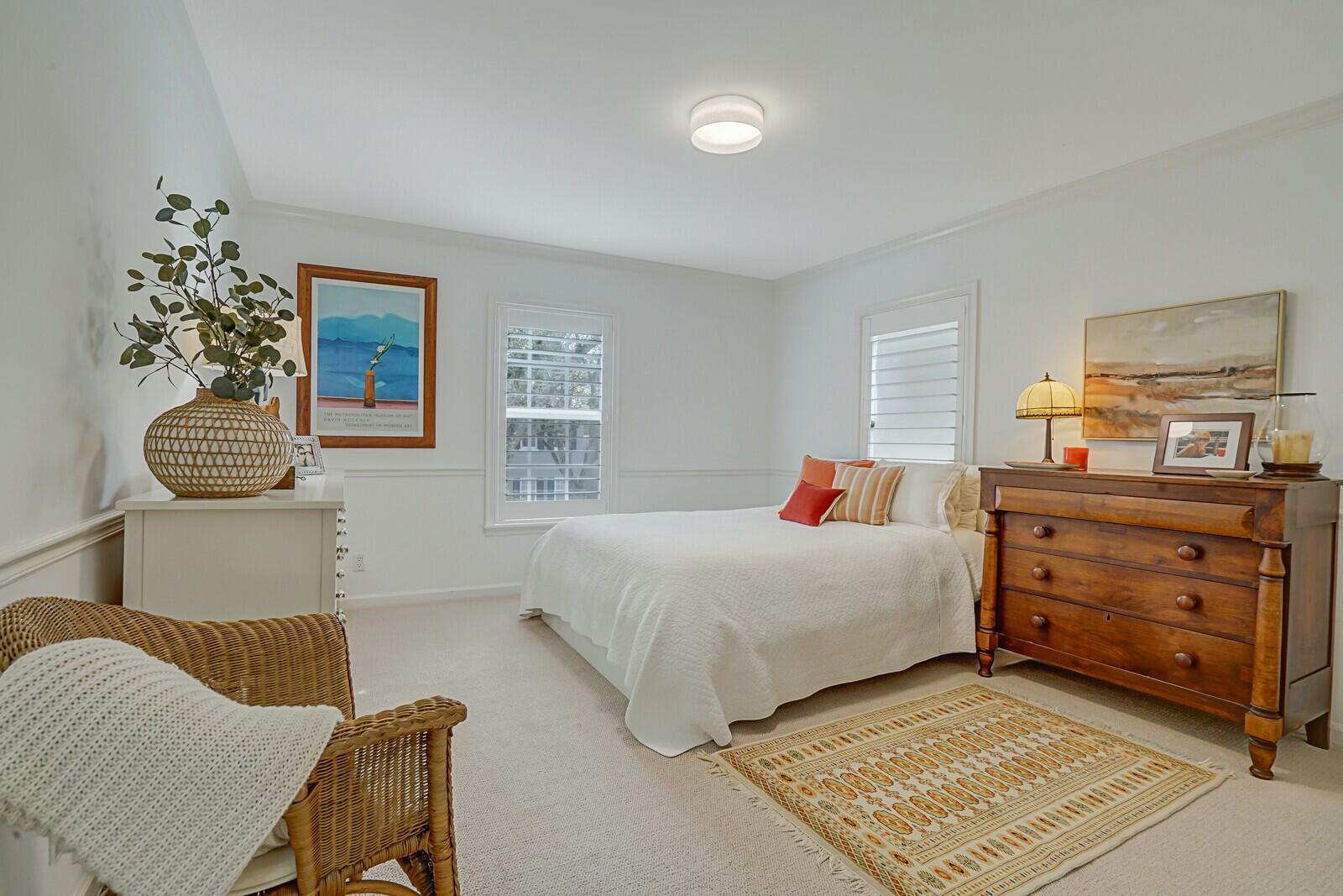 5961 Catesby Street Boca Raton, FL 33433 - Photo 29 of 41 a bedroom with a bed and window