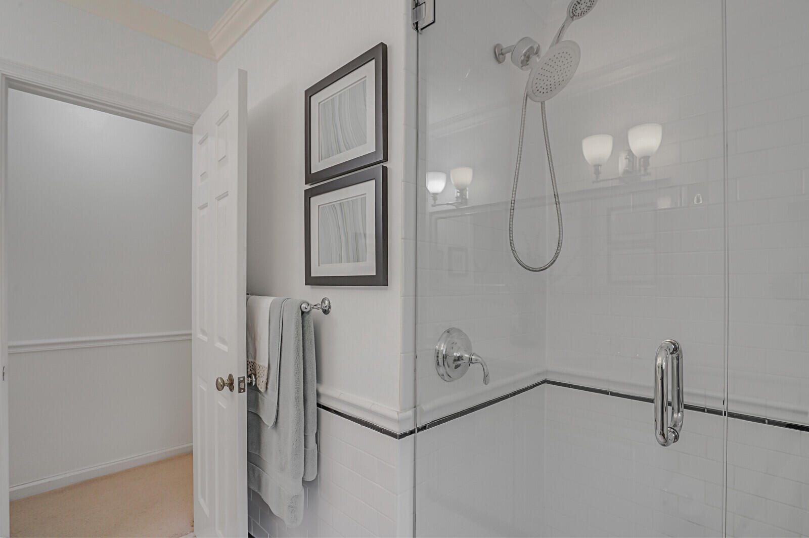 5961 Catesby Street Boca Raton, FL 33433 - Photo 31 of 41 a bathroom with a glass shower door