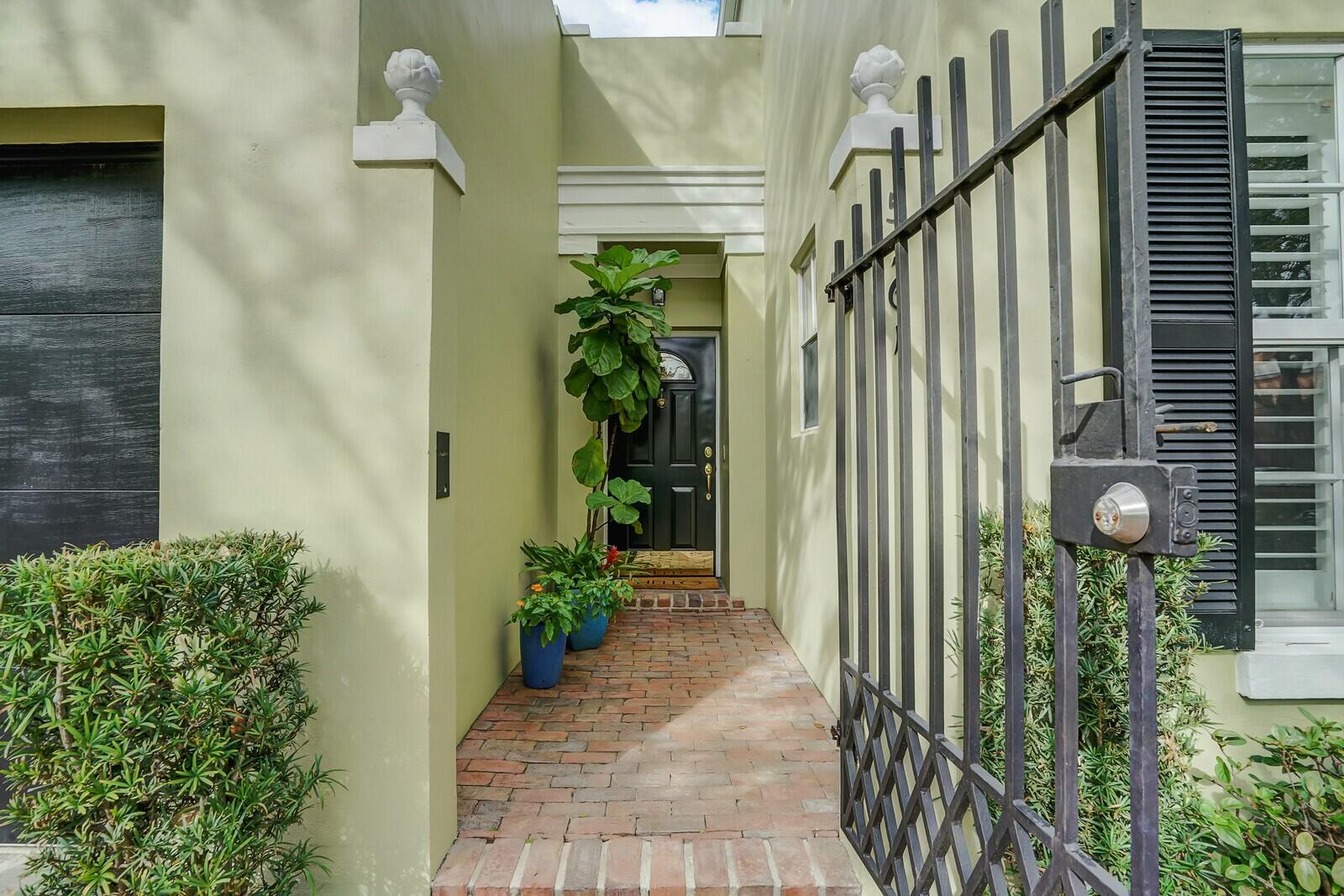 5961 Catesby Street Boca Raton, FL 33433 - Photo 4 of 41 a view of a house with potted plants