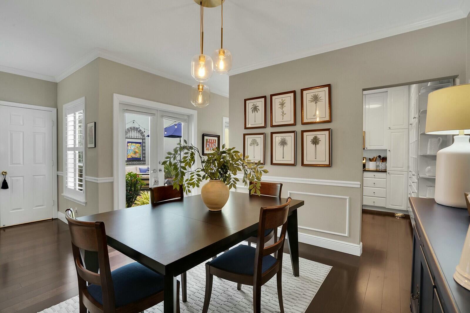 5961 Catesby Street Boca Raton, FL 33433 - Photo 9 of 41 a view of a dining room with furniture and wooden floor