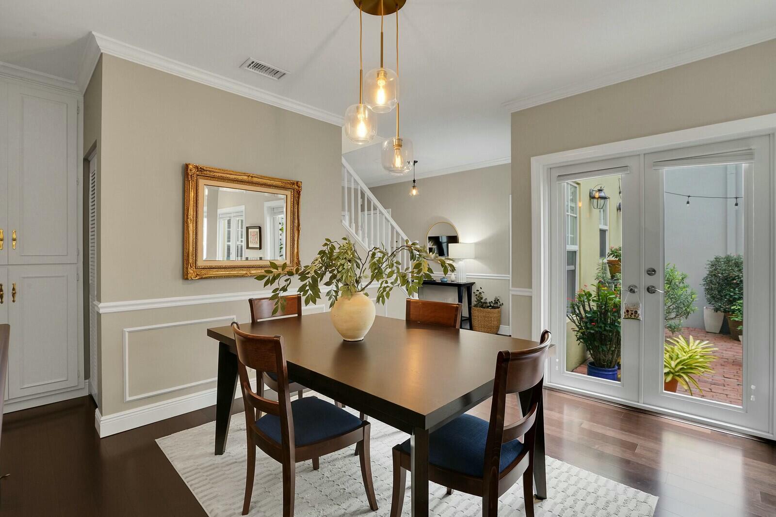 5961 Catesby Street Boca Raton, FL 33433 - Photo 10 of 41 a view of a dining room with furniture and wooden floor