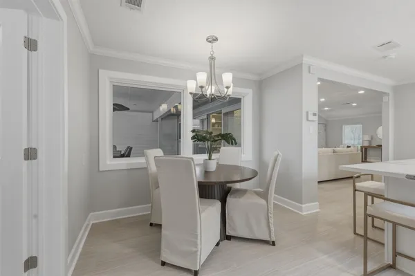 a view of a hallway with stairs