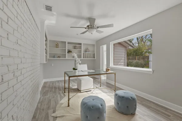 a bathroom with a tub and shower