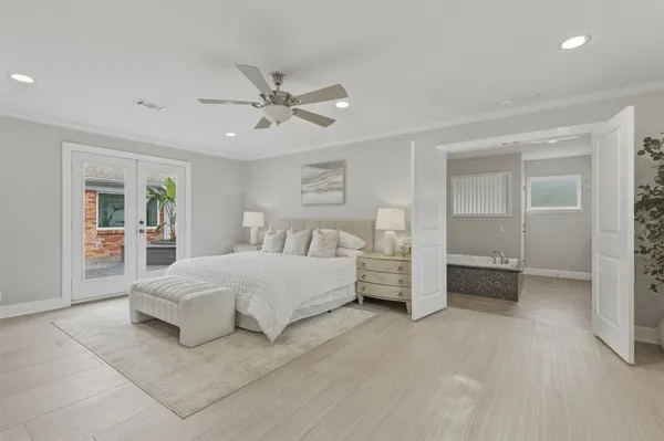 a bathroom with a sink a mirror and a bathtub