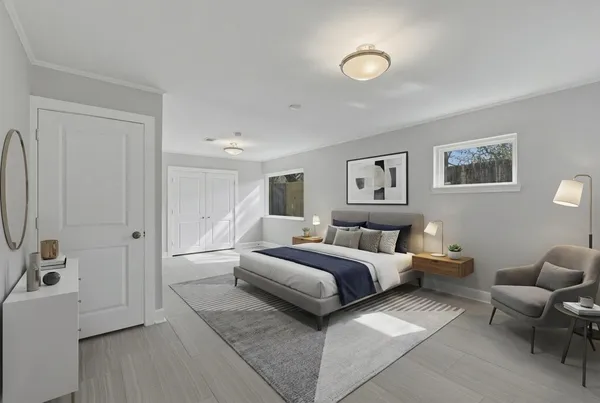 a house with potted plants in front of it